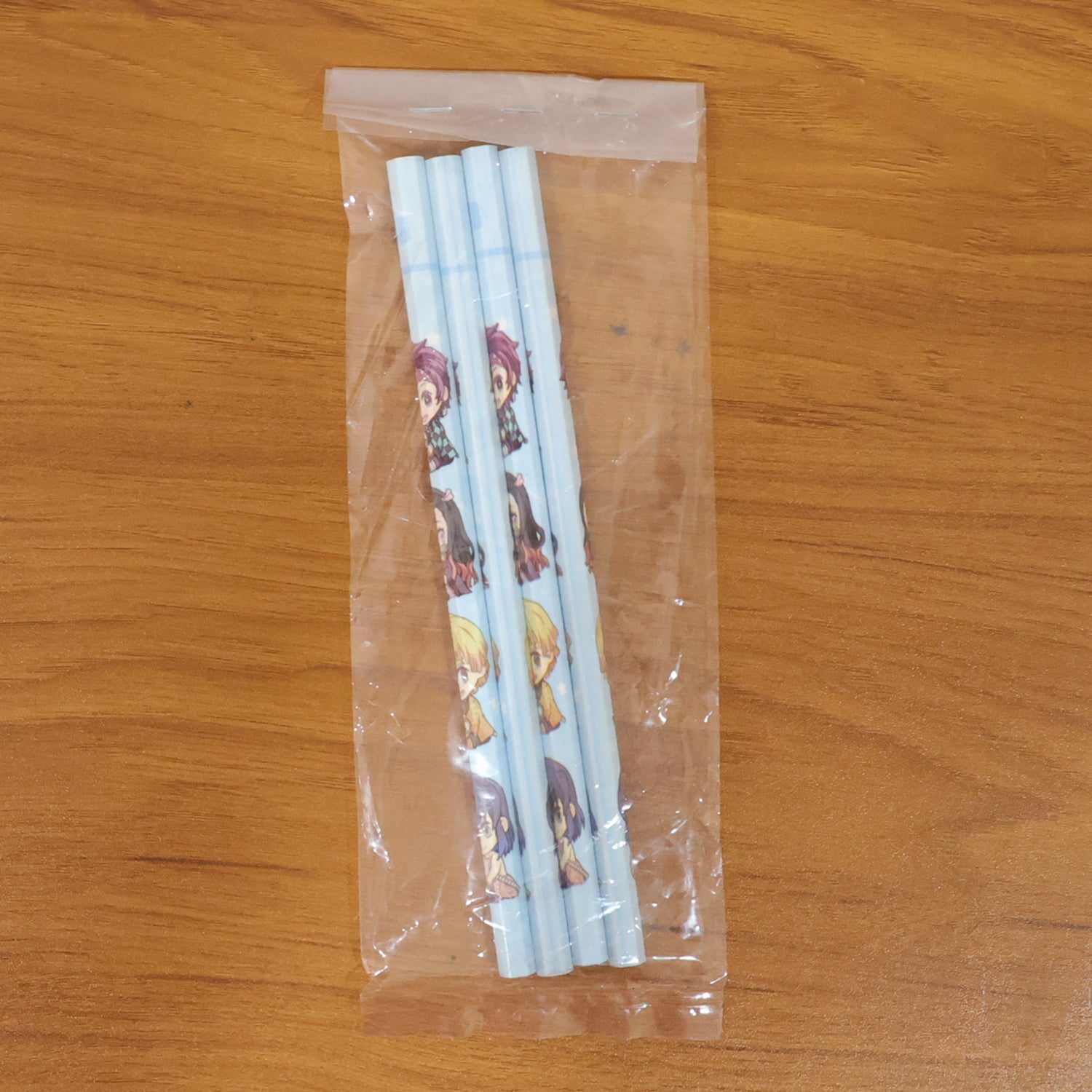 Pack of four cute cartoon printed school pencils for kids' writing needs