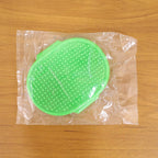 Soft bristle pet grooming scrub brush with adjustable hand strap