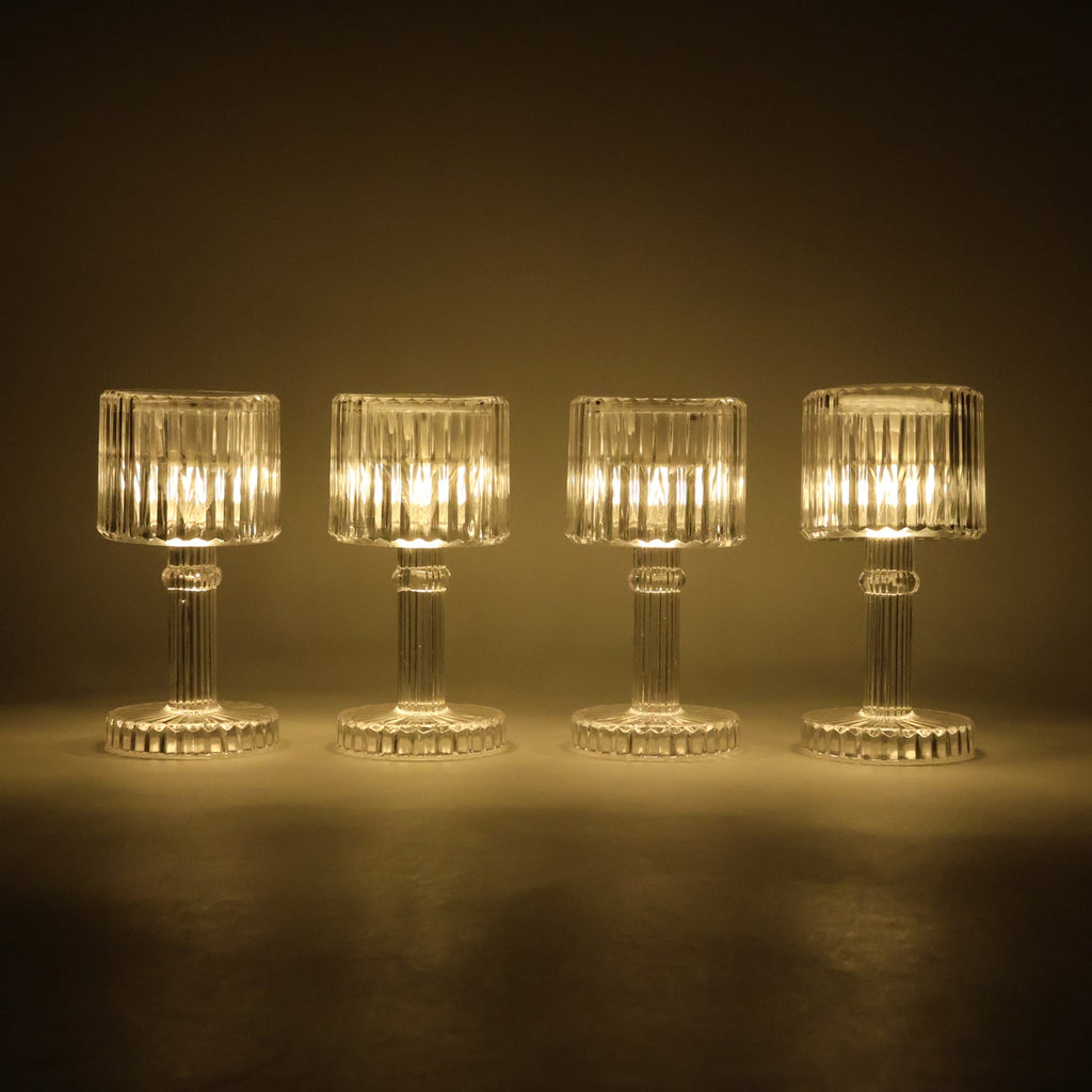 Battery operated crystal-effect LED mini table lamps arranged on table