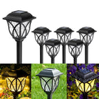 Waterproof FitFuzion solar lights demonstrating easy stake installation into soft garden soil.