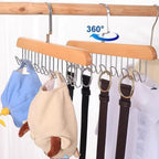 Innovative rotating hook design on the Organivo lotus wood hanger for easy access.