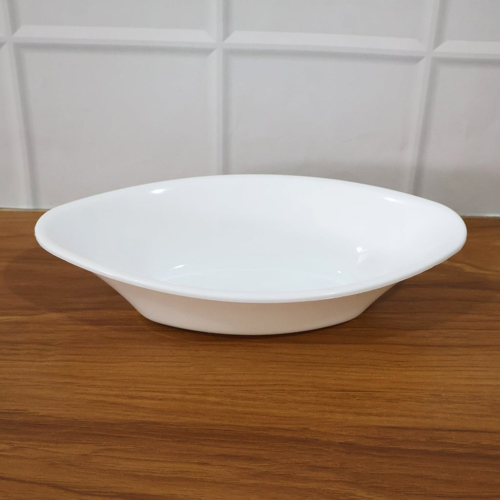 White Marin oval serving bowl measured with tape showing dimensions