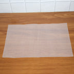 Close-up shot showing the textured surface of the refrigerator mat