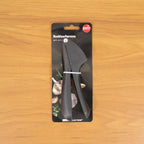 Compact handheld manual garlic press tool for efficient kitchen use
