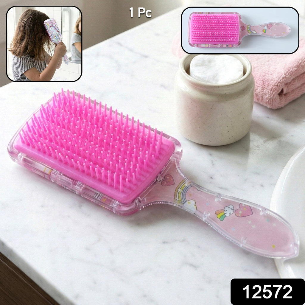 Kids hairbrush showing soft bristles and printed design