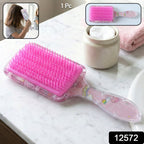 Kids hairbrush showing soft bristles and printed design