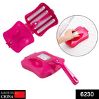 Plastic handheld carpet roller brush designed for deep cleaning and dust collection.