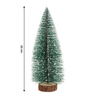 Festive tabletop mini Christmas tree with snow effect and natural wooden stand