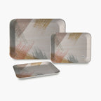 Three multicolor serving trays available in small, medium, and large sizes for dining.