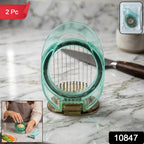 Person using manual vegetable slicer to cut carrots easily