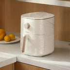 Another view of a disposable furniture cover protecting a dining table.