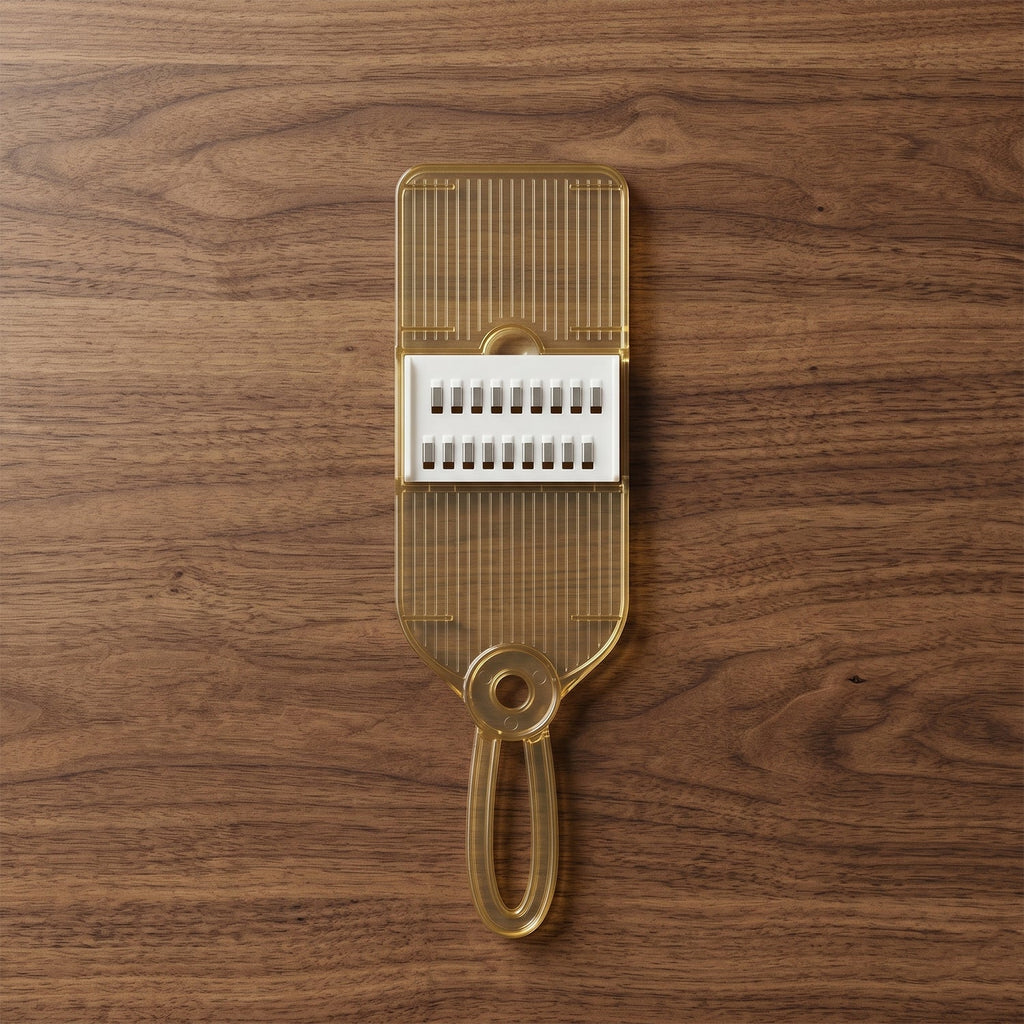 Handheld kitchen tool for vegetable and fruit slicing