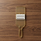 Handheld kitchen tool for vegetable and fruit slicing
