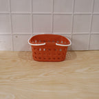 Basket in outdoor picnic setting for fruits and essentials