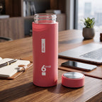 400ml glass water bottle with silicone sleeve on white background