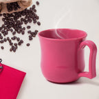 Overhead shot of a plastic mug, emphasizing its wide opening suitable for easy cleaning.