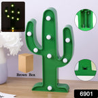 LED Cactus Lamp illuminating a modern desk setup with a warm glow.