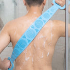 Using silicone body scrubber with soap in shower