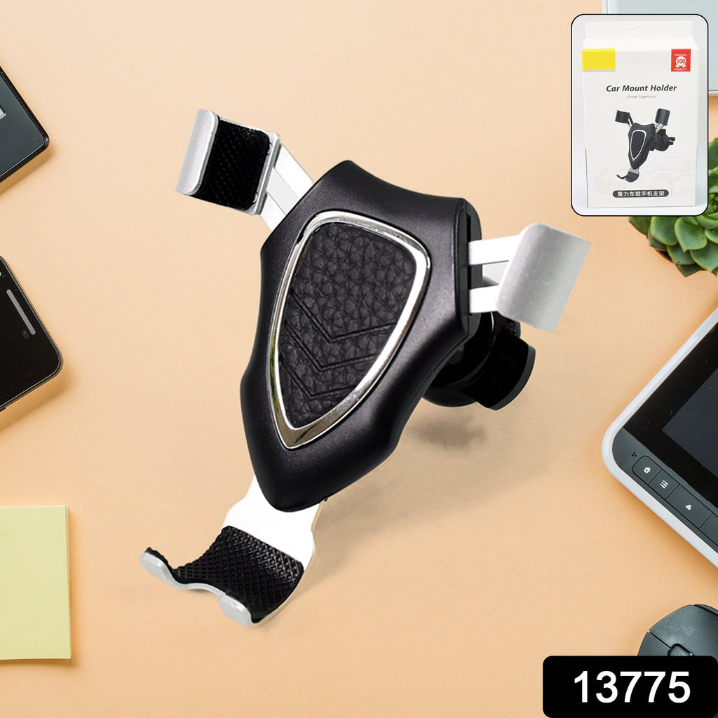 Close-up of the gravity grip mechanism on the car phone mount.