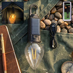 Carabiner clip attached to solar camping lantern for hanging