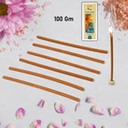Burning Bela Ke Phool incense stick in a stand, releasing fragrant smoke for pooja.
