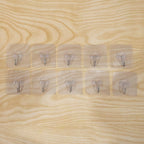 Adhesive wall hooks displayed for daily use