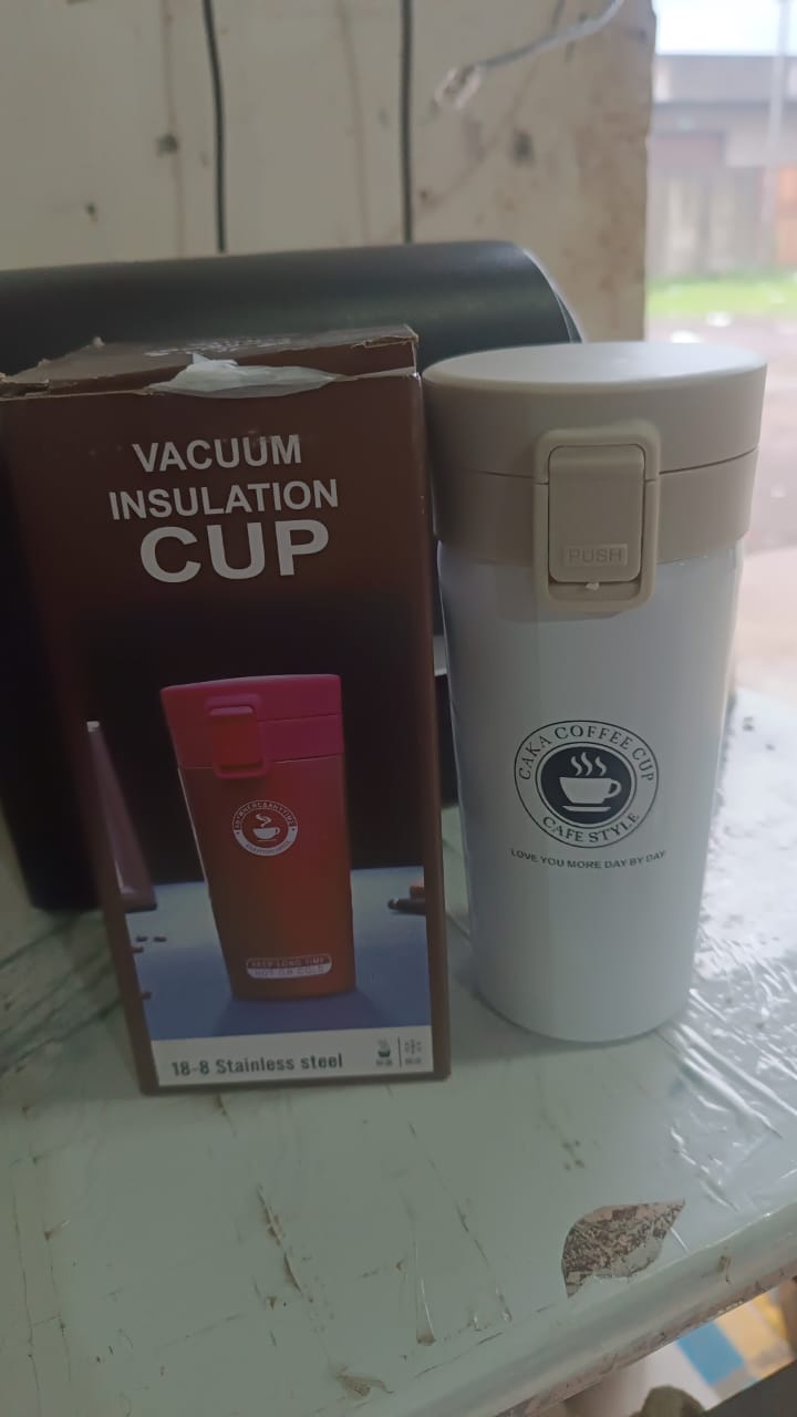 Alternative angle of vacuum insulated coffee flask with flip lock lid