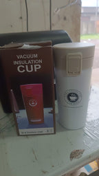 Alternative angle of vacuum insulated coffee flask with flip lock lid