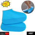 Two blue silicone rain boot covers with zig-zag textured soles, with a person wearing them in a small circular inset.