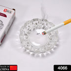 Clear round crystal glass ashtray featuring 4 convenient slots for cigars and cigarettes.
