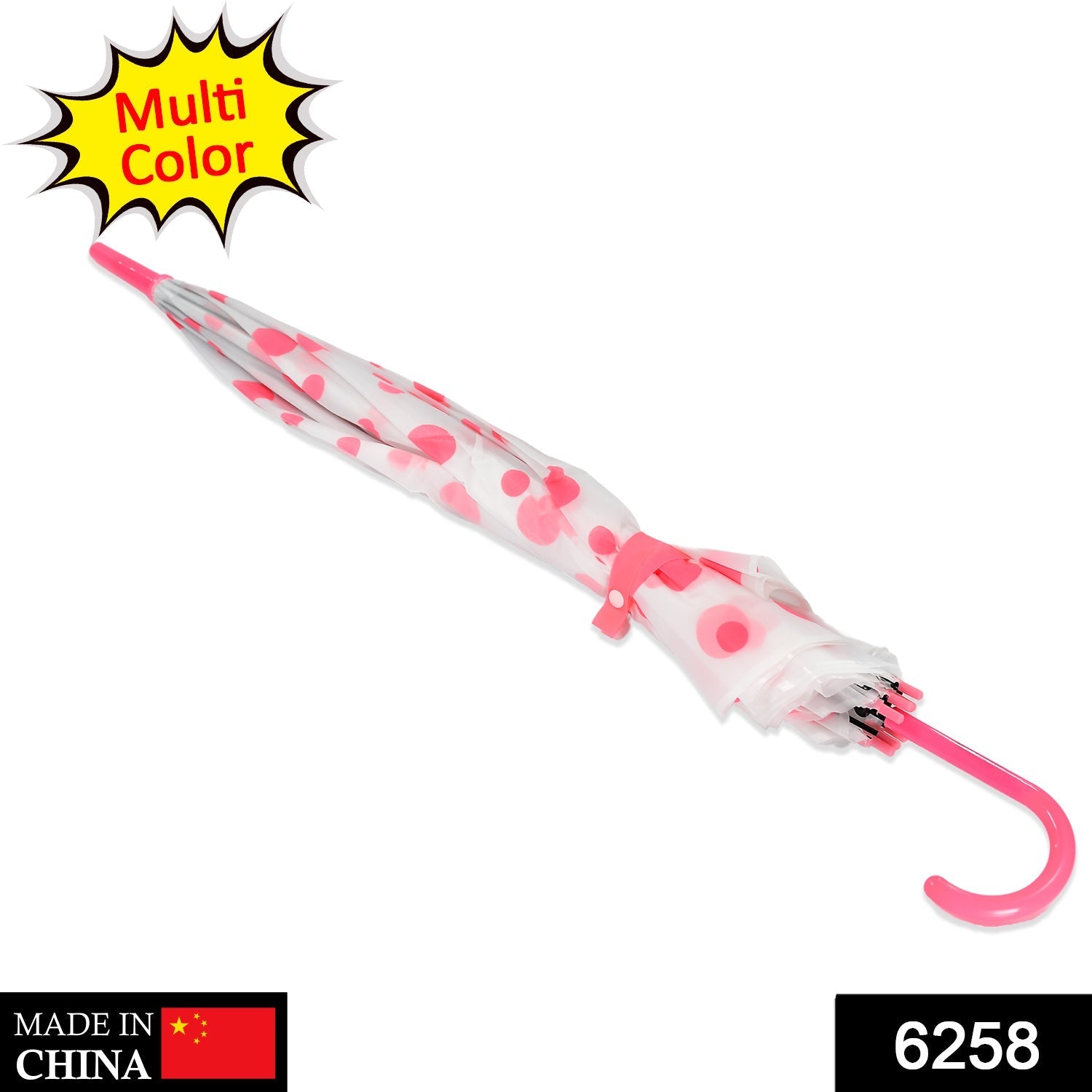 A closed white umbrella with pink polka dots and a curved pink handle lies diagonally on a white background.