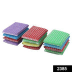 Close-up of a scratch-proof kitchen scrubber pad in action.