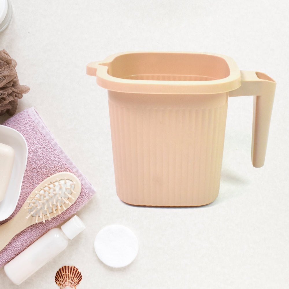 Clear Plastic Bath Mug on a plain background, highlighting its simple, functional design.