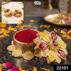Traditional golden sindoor holder for puja