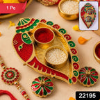 Decorative leaf shaped kankavati with red and green enamel accents