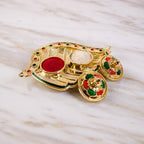 Detailed view of mango kumkum holder
