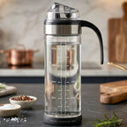 Glass oil dispenser bottle with handle and flip lid for kitchen