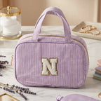 Hanging multi-pocket travel toiletry bag showcasing multiple compartments