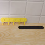 Self-adhesive five-hook hanger lifestyle view