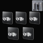 Set of five durable adhesive plastic wall hooks for home organization