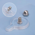 Close-up of metal peg on transparent self-adhesive wall hook