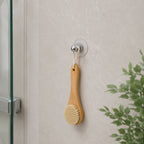 Bathroom essentials organized with wall hooks