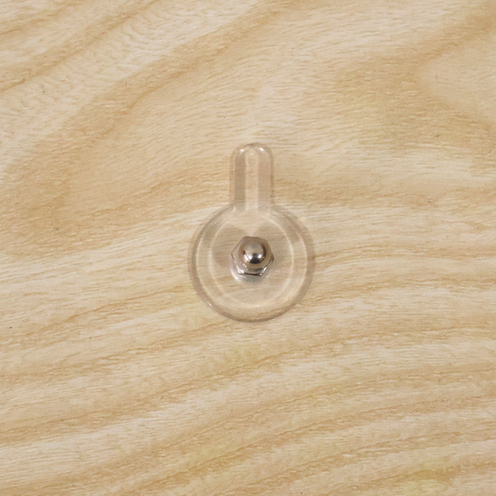 Everyday use of adhesive wall hook for home organization