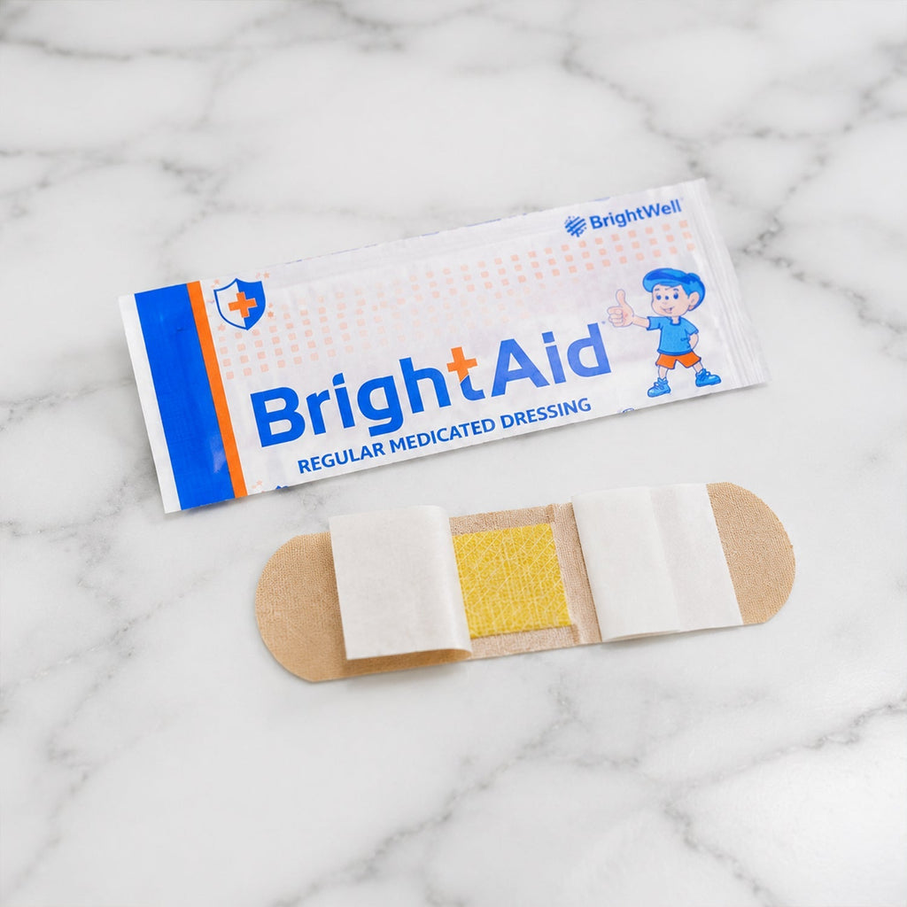 Open pack of BrightAid adhesive bandages showing multiple strips.
