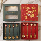 Elegant gift box containing mixed golden cartoon spoons