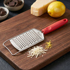 Stainless steel vegetable and citrus zest grater
