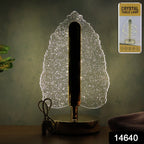 Elegant LED crystal leaf table lamp with USB power and metallic base on a desk