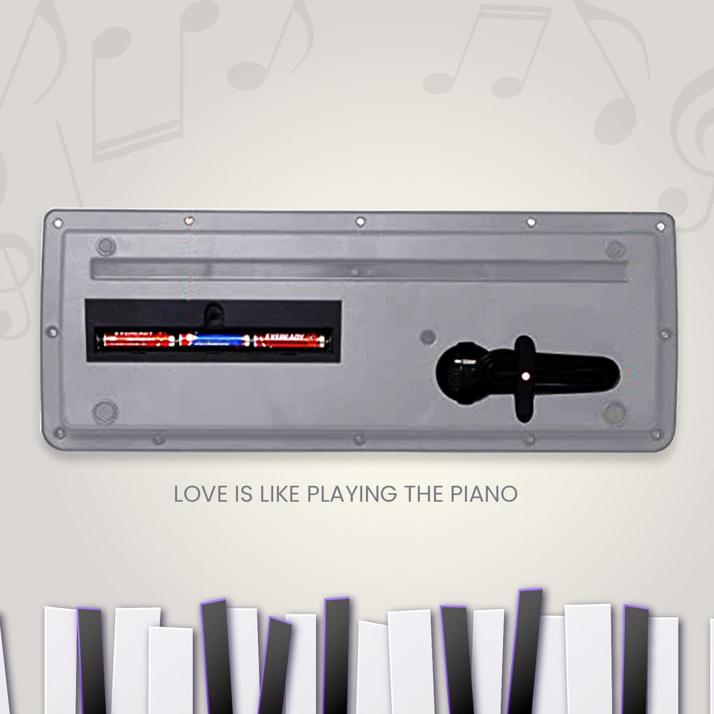 Close-up of the microphone input on the kids piano keyboard.