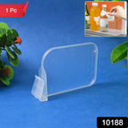 Plastic refrigerator organizer basket in use holding bottles and cans