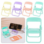 Ergonomic chair mobile stand securely holding a smartphone for hands-free viewing.